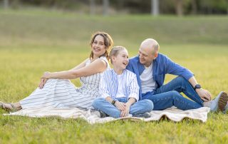 Family enjoying time together during a spring photo session in the park